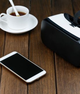 vr-glasses-cell-phone-wooden-desk